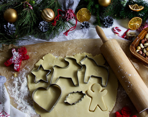 Fototapeta Naklejka Na Ścianę i Meble -  Christmas cookies of different shapes on a dish in a festive decor