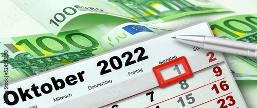 Deutscher Kalender Datum 1. Oktober  2022 Samstag und 300 Euro Geldscheine photo