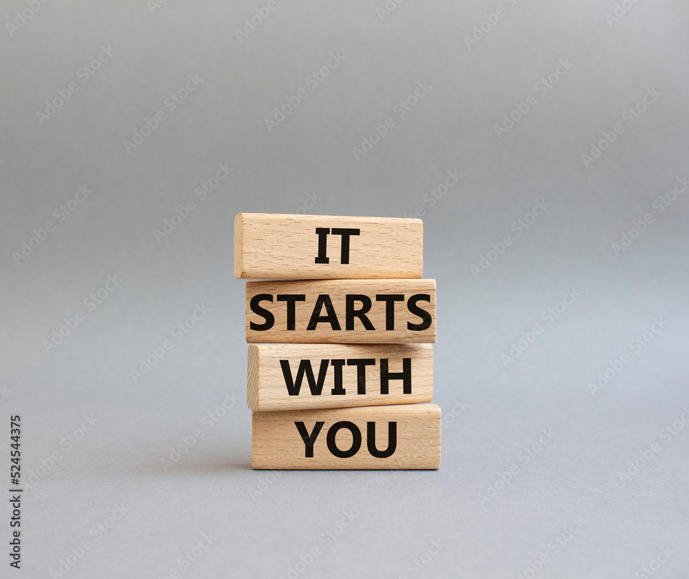 It starts with you symbol. Wooden blocks with words It starts with you. Beautiful grey background. Business and It starts with you concept. Copy space. It starts with you symbol. Wooden blocks with words It starts with you. Beautiful grey background. Business and It starts with you concept. Copy space.