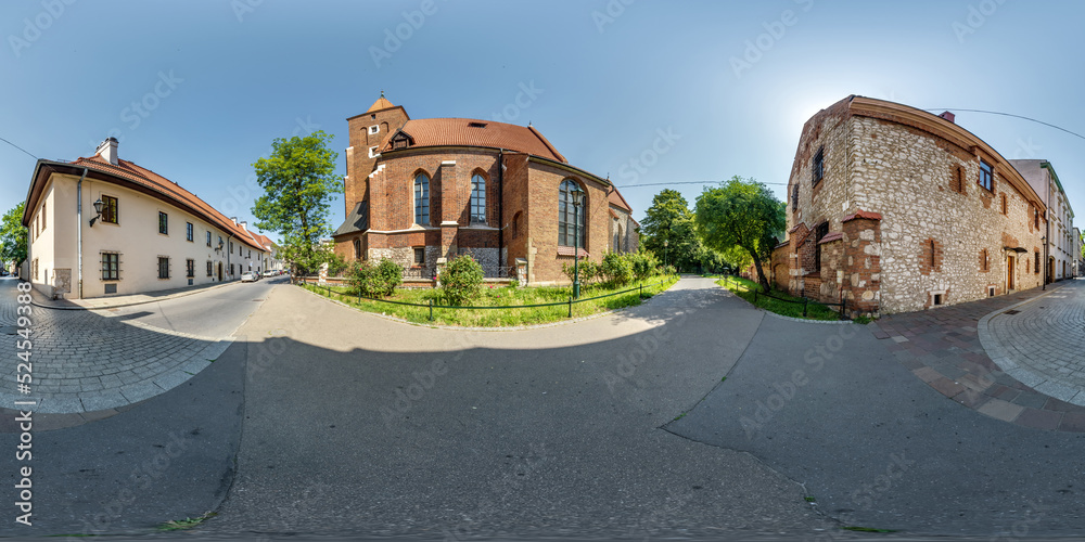 full 360 hdri panorama on near catholic gothic church red brick walls in old town with historical buildings, temples and town hall in equirectangular projection