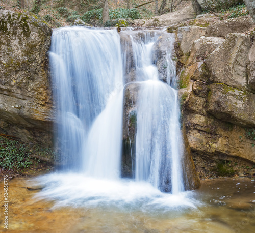 Fototapeta Naklejka Na Ścianę i Meble -  beautiful small waterfall in mountain, beautiful natural background