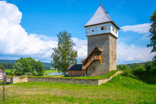 Medieval Gothic Fortress with renovated tower photo