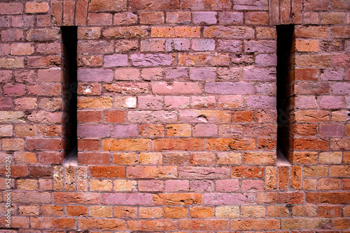 Tekstura ściany z cegły tła, zabytkowy budynek.