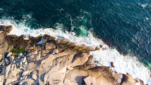 Waves hitting the rocks Aerial on Peggy's Cove, Nova Scotia, Canada