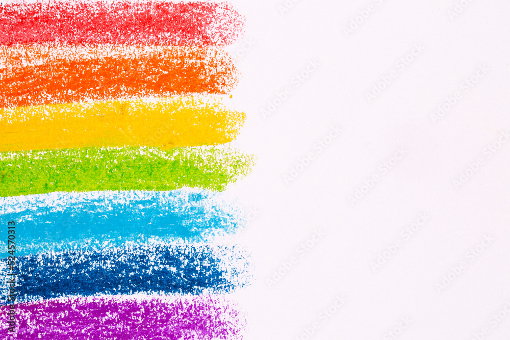 Colorful pastel crayons with painting background