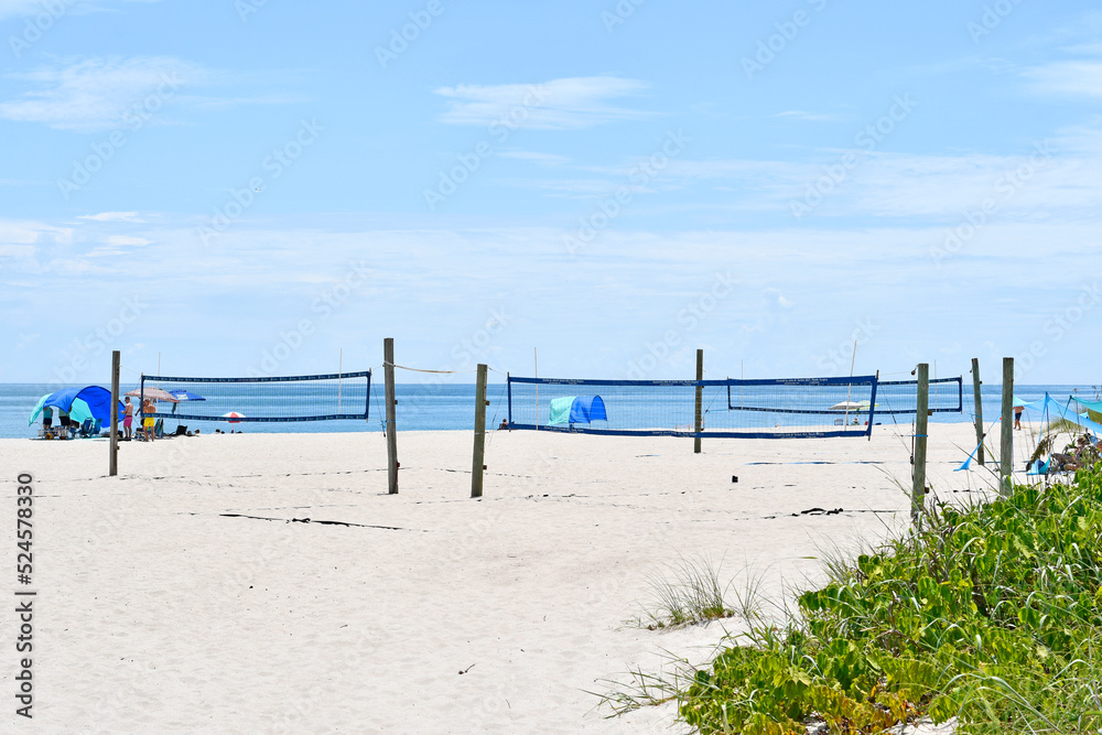Empty volleyball nets waiting for players at Vero Beach, Florida on Hutchinson Island