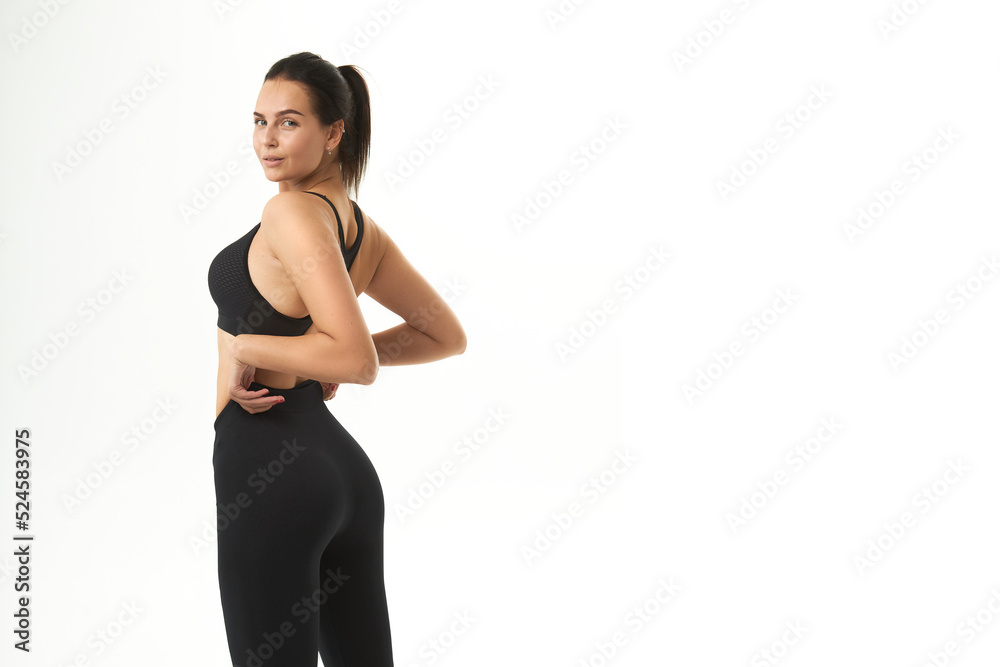 young slim woman posing in underwear and leggings. female back, buttocks. Concept beauty, body and skin care, medicine, health, spa, cosmetics, young slim woman posing in underwear and leggings. female back, buttocks. Concept beauty, body and skin care, medicine, health, spa, cosmetics,