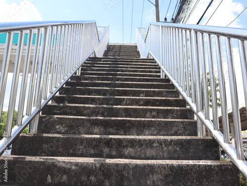 Bottom view of stairs of the pedestrian overpass in the city