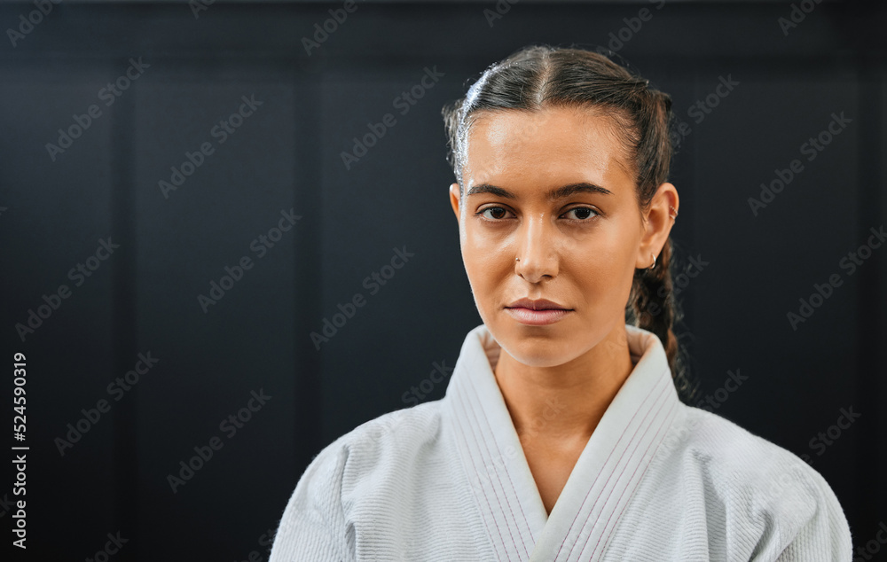Karate, martial arts or taekwondo woman, coach or trainer with vision, motivation or power in wellness gym. Fitness portrait of serious or fit sport fighter after health workout, exercise or training Karate, martial arts or taekwondo woman, coach or trainer with vision, motivation or power in wellness gym. Fitness portrait of serious or fit sport fighter after health workout, exercise or training