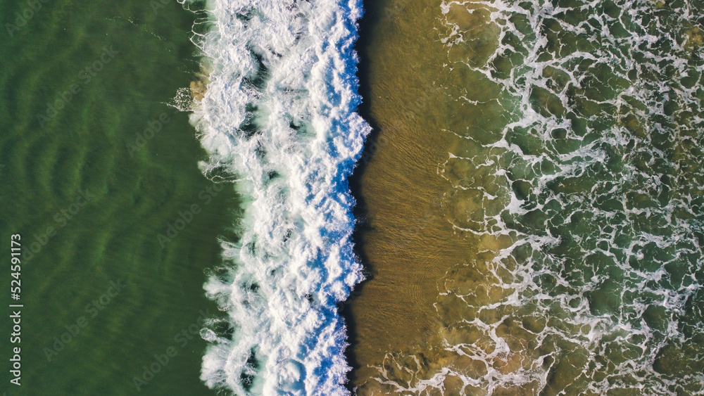 Drone view from the waves in florianopolis
