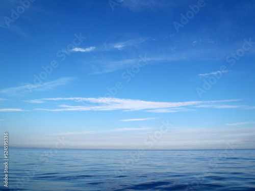 Sunny blue sky with sea horizon texture. © SAIGLOBALNT
