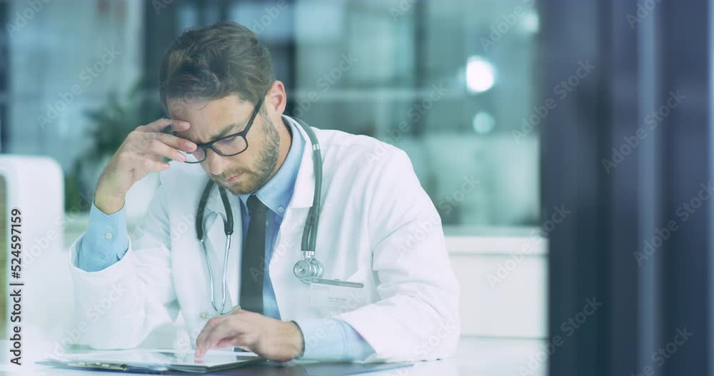 Doctor doing research on digital tablet and thinking about medicine, surgery innovation and health. Frustrated, confused and unsure healthcare worker browsing the internet and analyzing science data