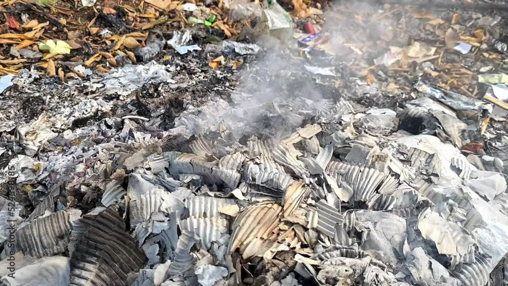 Burning garbage dump pollution. Garbage and fire burn in landfill. Also call trash, waste, rubbish. Destruction with combustion, heat, flame. Occurs smoke, toxic cause of air pollution Burning garbage dump pollution. Garbage and fire burn in landfill. Also call trash, waste, rubbish. Destruction with combustion, heat, flame. Occurs smoke, toxic cause of air pollution