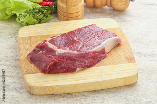 Raw rib-eye beef steak black angus