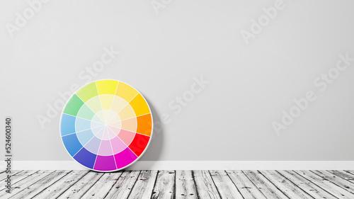 Color Wheel on Wooden Floor Against Wall photo