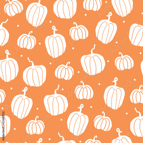 Beautiful seamless pattern of autumn Halloween pumpkins, cute white pumpkins and dots, orange background, print for seasonal textile prints, backgrounds or wallpapers.