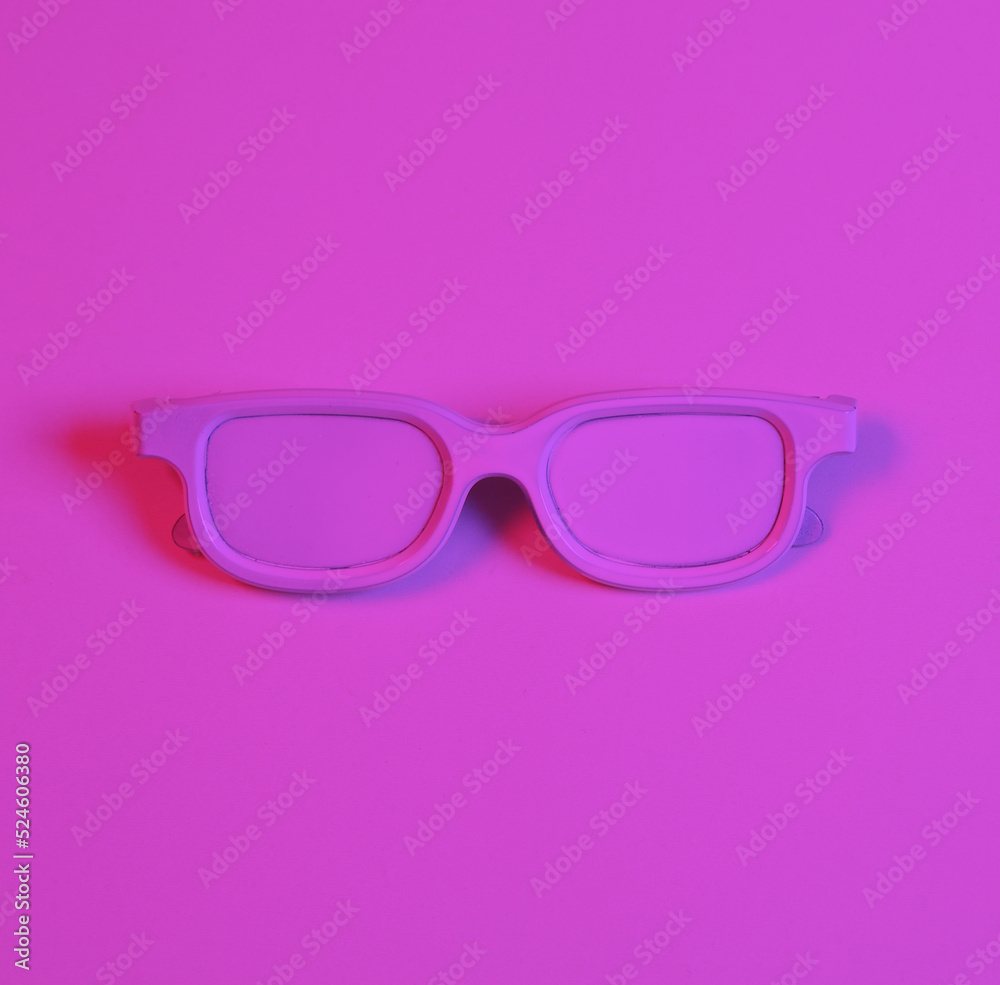 White glasses in pink-blue neon light. Minimalism music concept