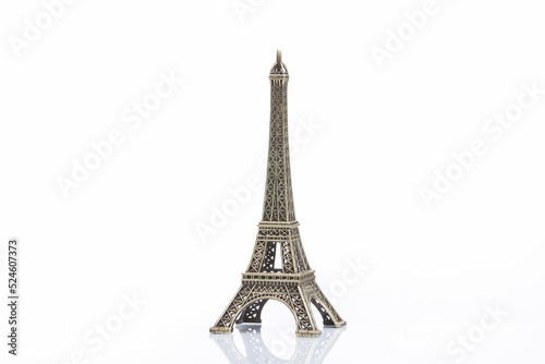 Eiffel tower miniature isolated on white background © splitov27