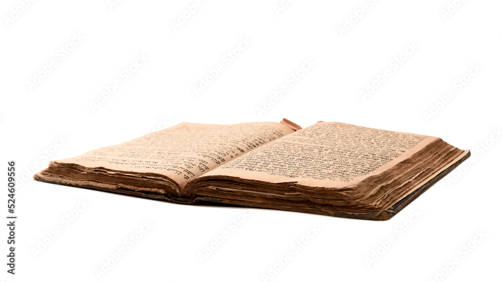 Single old worn jewish book. Open shabby pages of Siddur isolated on white background. Closeup. Selective focus.
