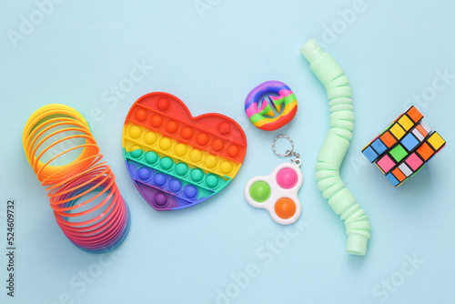 Quadro su tela Odessa, Ukraine - june 7, 2022: Different antistress sensory toys on blue backgr