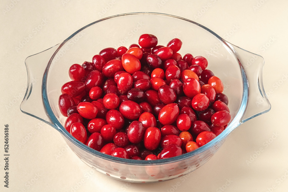 Fresh cranberries in a glass bowl. Healthy eating concept Fresh cranberries in a glass bowl. Healthy eating concept
