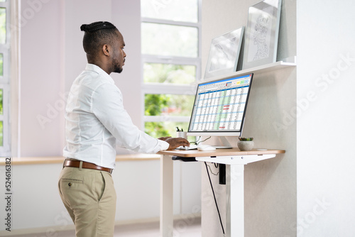 Schilderij op canvas Adjustable Height Desk Stand In Office