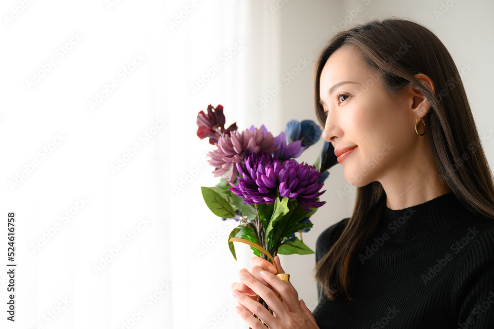 Beautiful Asian woman with purple flowers Easy to use in fall Beautiful Asian woman with purple flowers Easy to use in fall