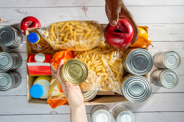 Help Collection Center, Free Food Distribution. Volunteering, food donation box grocery set for in-need people