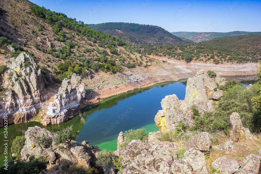Rocks and lake of the Monfrague national park, Spain