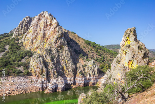 Colorful rocks and river of the Monfrague national park, Spain photo