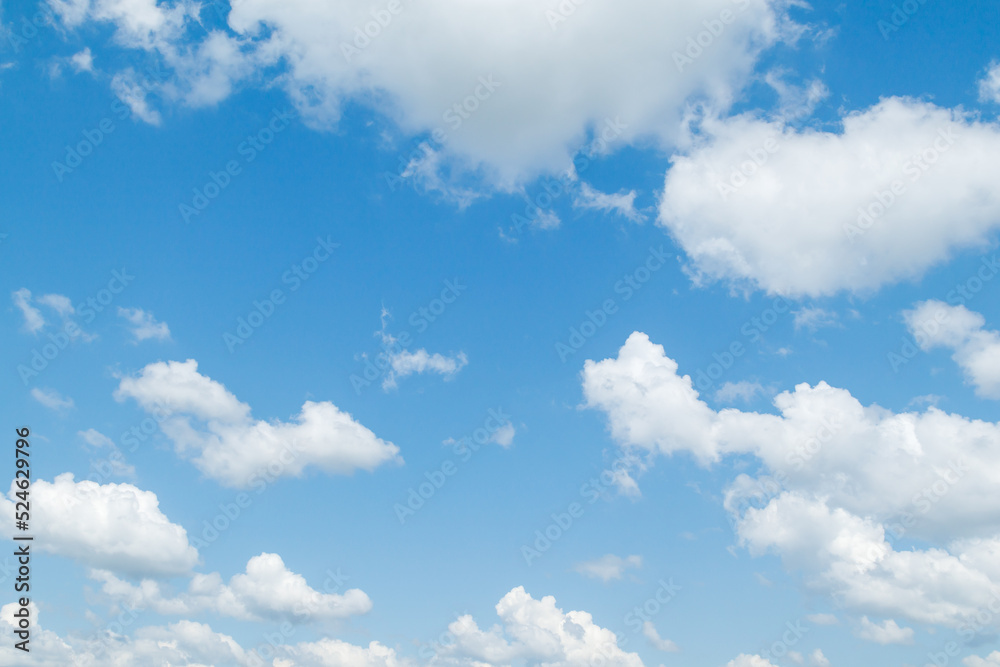 Blue sky with cumulus clouds at daytime. Natural panoramic background photo texture Blue sky with cumulus clouds at daytime. Natural panoramic background photo texture