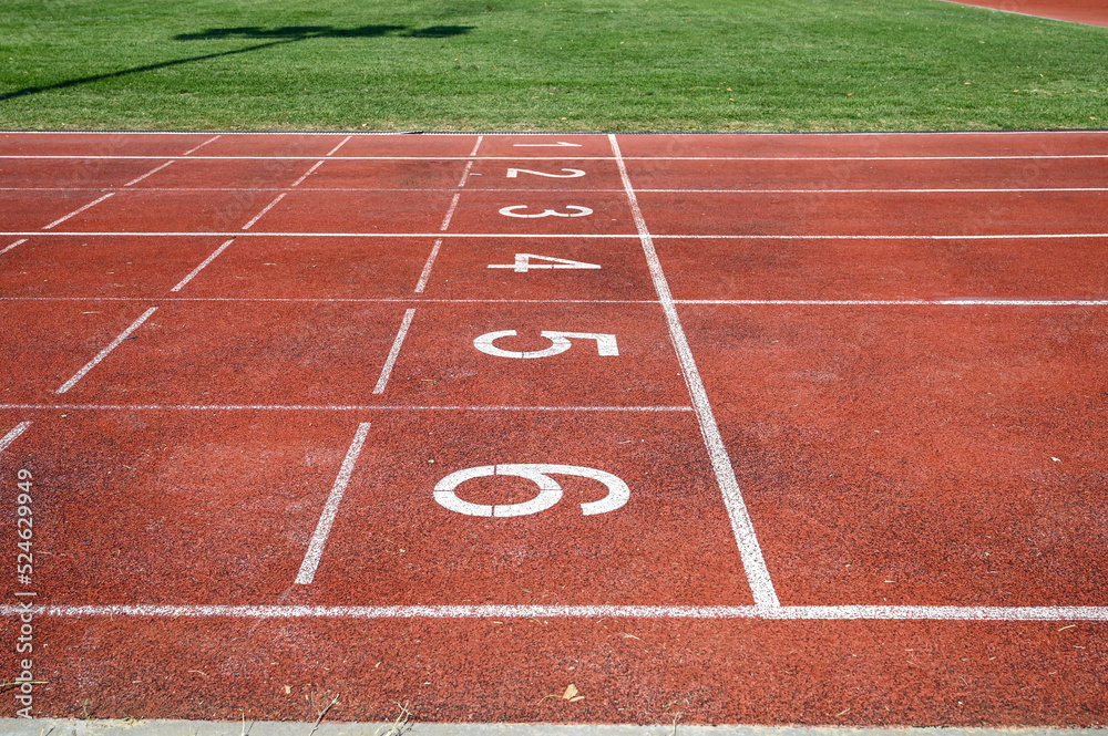 Running track numbers. Red running track with lanes and numbers. Starting positions for running at stadium.