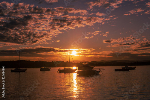 sail boats sunset on the lake