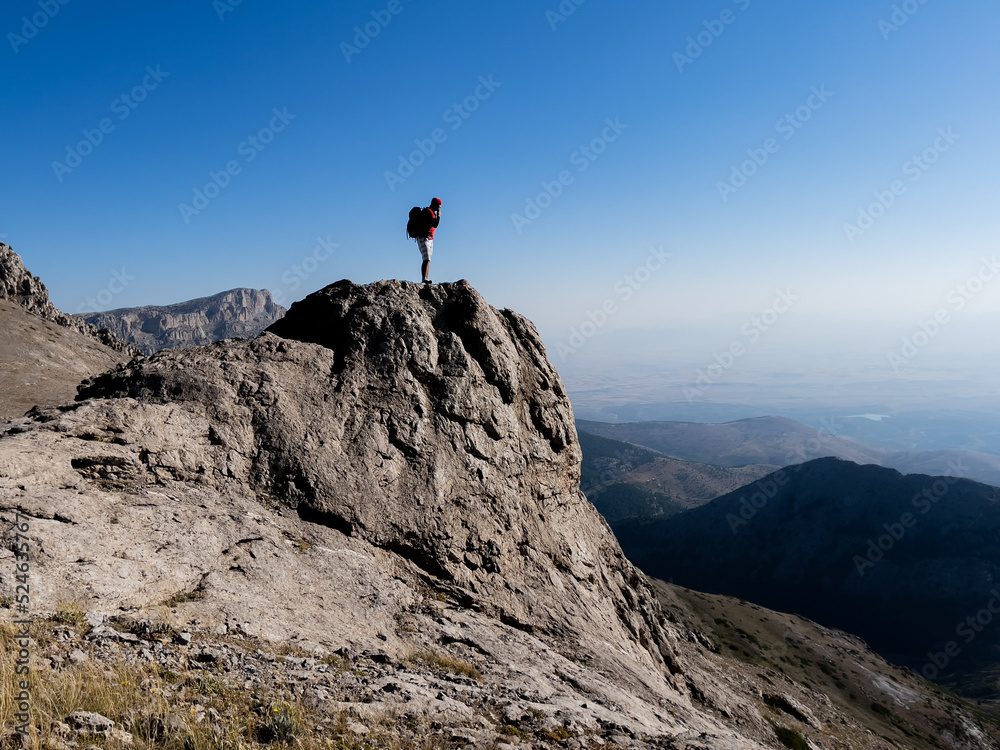 brave mountaineer on a voyage of discovery in the peak mountains