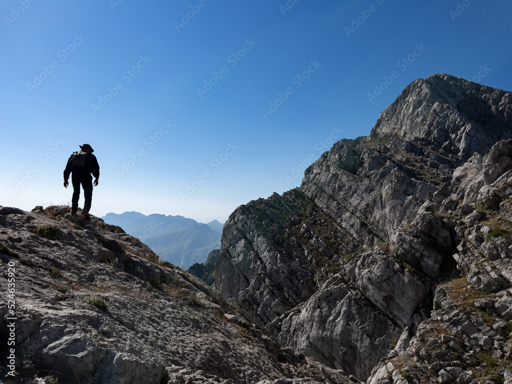 hike of mountaineer exploring on top of mountains