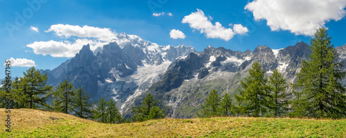 The panorama of Mont Blanc massif from Val Ferret valley in Italy. photo