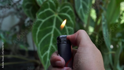 lighting a gas lighter taken close up