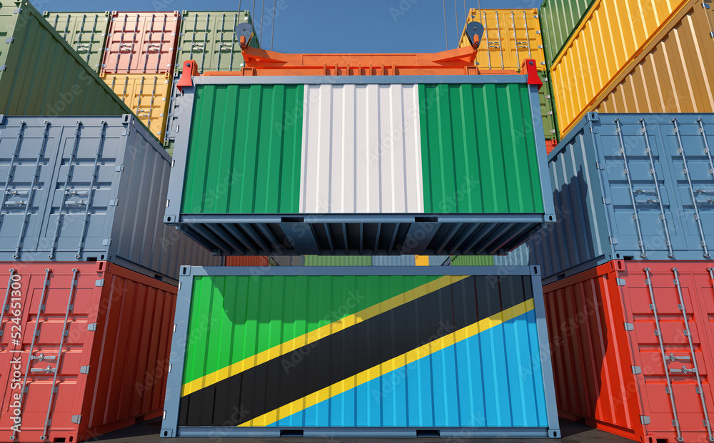 Fototapeta premium Cargo containers with Nigeria and Tanzania national flags. 3D Rendering