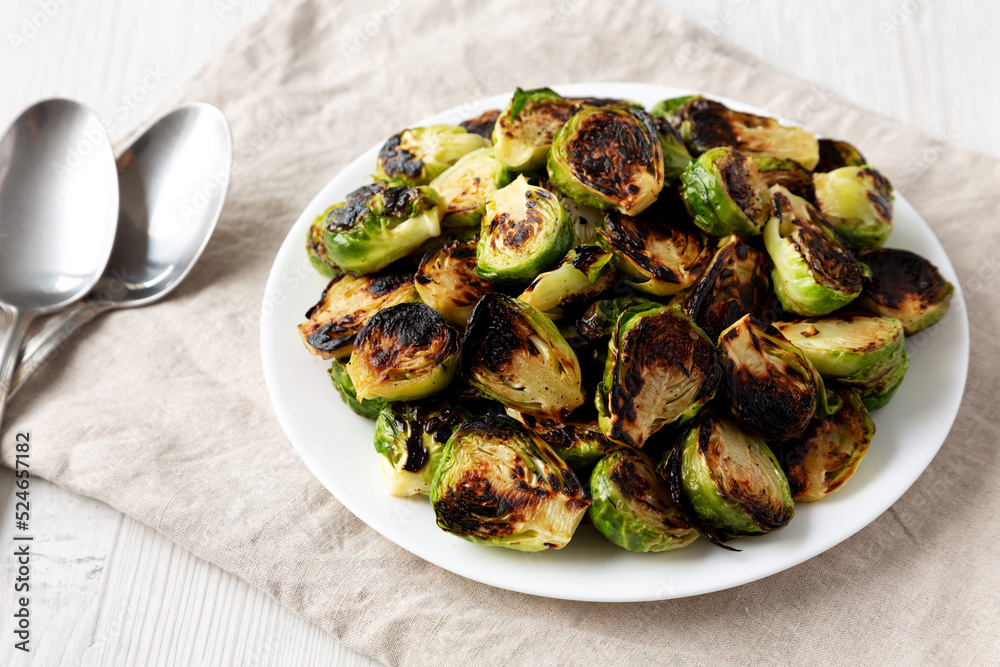 Homemade Roasted Brussel Sprouts on a Plate, low angle view.