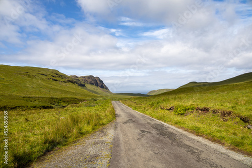 Scottish Highlands typical landscaped and scenery, bright green lawns, roads to nowhere, tranquil lochs. Fairy tale views.