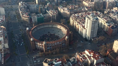 Aerial footage of historic round La Monumental arena. People on event inside arena. Barcelona, Spain