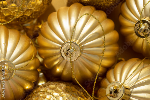 macro detail of beautiful shiny golden Christmas baubles
