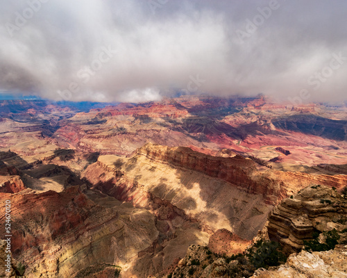 red mountains from the grand canyon with gloomy sky
