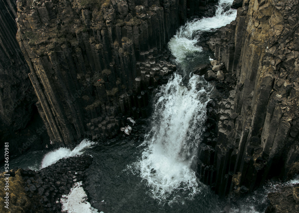 Fototapeta premium Famous Litlanesfoss waterfall near Hengifoss, in eastern Iceland.