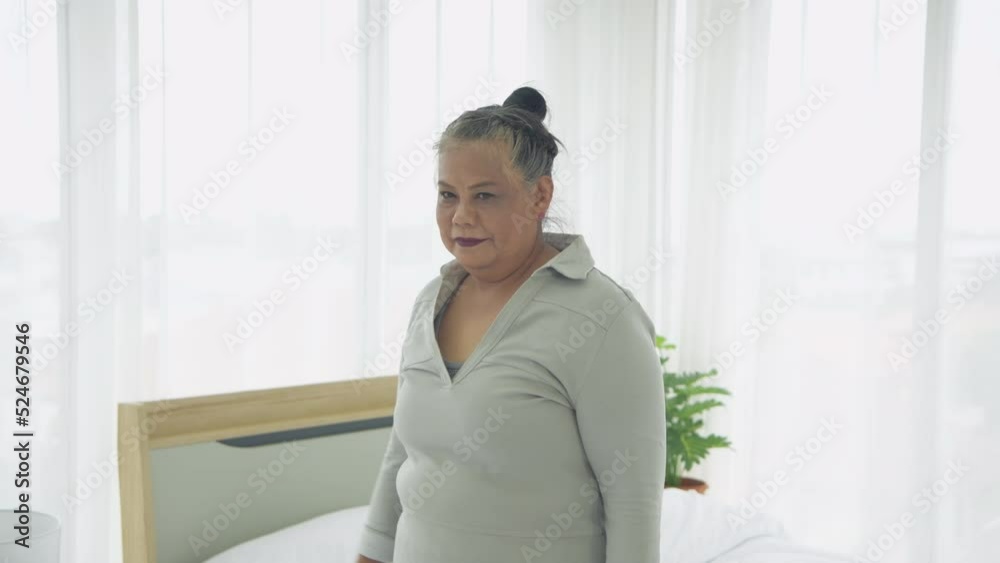 Exercise concept of 4k Resolution. Asian elderly woman exercising at home. Exercise concept of 4k Resolution. Asian elderly woman exercising at home.