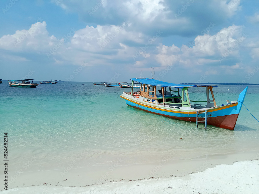 Boat on the beach. Tanjung Kelayang Beach, Belitung Island, Indonesia.