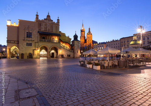 Krakow. Market square in the night lights at sunrise.