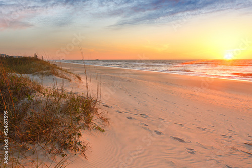 Beautiful sunrise over Kure Beach, Kure Beach, North Carolina USA. Kure Beach is a town 15 miles south of Wilmington, North Carolina