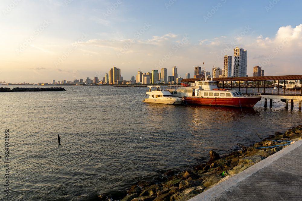 Manila Bay is a harbor that serves the Port of Manila