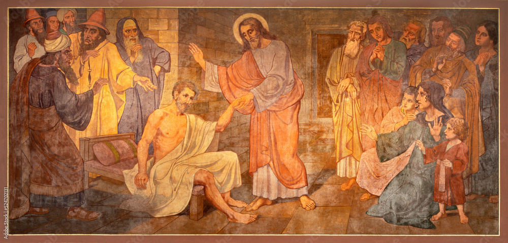 BERN, SWITZERLAND - JUNY 27, 2022: The fresco of Christ at the healing in the church Dreifaltigkeitskirche by August Müller (1923). - obrazy, fototapety, plakaty 